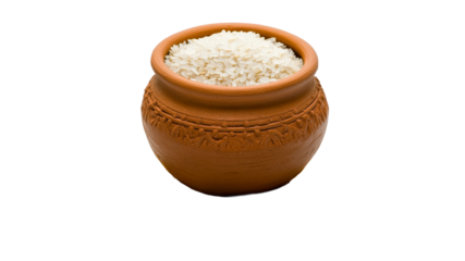 Traditional clay pot filled with uncooked rice