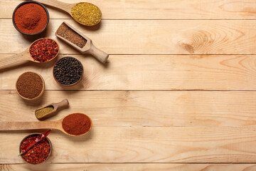 Composition with fresh aromatic spices on wooden table