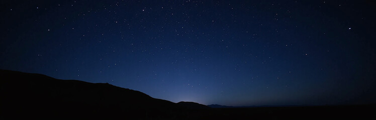 Dark Skies Illuminated By A Vast Canvas Of Twinkling Stars In The Serene Night Landscape Above. 00001