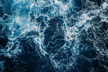 Naklejka premium Turbulent ocean waves from above in blue tones. AI image