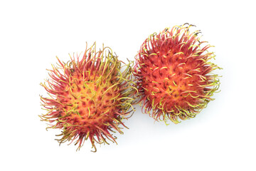 group of fresh rambutan (nephelium lappaceum) fruits, edible white pulp inside and red peel with...