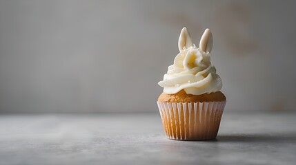 cupcake with icing and sprinkles