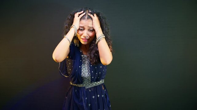 Woman stand looking depressed and hopeless