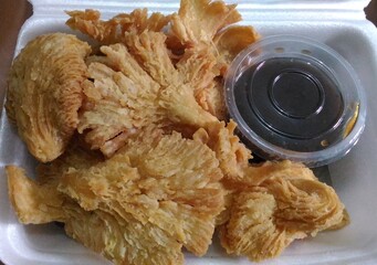 Fried oyster mushrooms served in a box