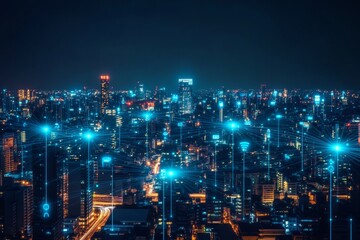Obraz premium Futuristic city landscape at night It lights up with a glowing blue wireless signal representing 5G technology.
