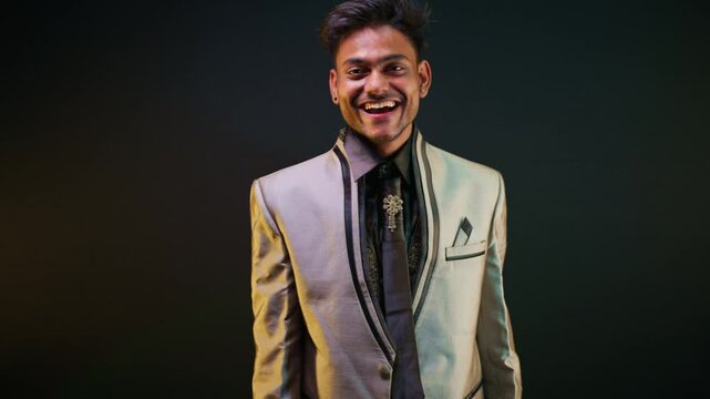 Gentleman holding hand up celebrating success