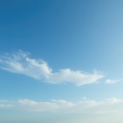 Fototapeta premium Clear blue sky with wispy clouds that stretch across the horizon, blue, clouds, calm
