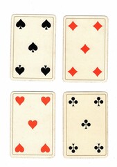 Four antique playing cards of the same value on a white background.
