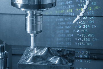 Abstract scene the CNC milling machine rough cutting the injection mold parts and G-code data...