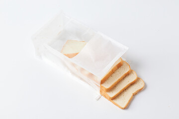 Slices of Fresh Bread in a Transparent Bag on a White Background Ready for Use in Meals and Snacks
