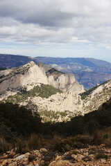 The mountain panorama opening from the hiking path to pick Puig Campana, Finestrat, Benidorm, Spain   