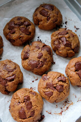 Chocolate cookies on a baking tray. Homemade baking.