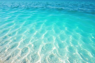 Obraz premium Crystal clear water surface with circular waves gently lapping against the shore , beach, ocean