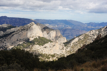 The mountain panorama opening from the hiking path to pick Puig Campana, Finestrat, Benidorm, Spain   