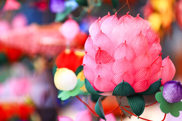 pink and red lotus lantern at a market