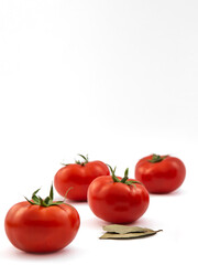 Tomatoes on white background. Isolated tomatoes on white background.