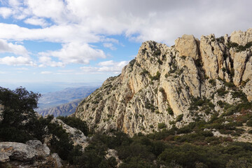 The mountain panorama opening from the hiking path to pick Puig Campana, Finestrat, Benidorm, Spain   