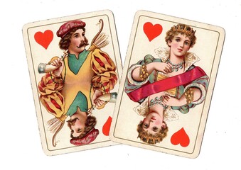 A blackjack or pontoon hand of antique playing cards on a white background.