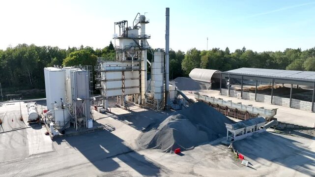 Industrial Facility with Extensive Sand and Gravel Storage and Machinery. Top view of industry manufactory