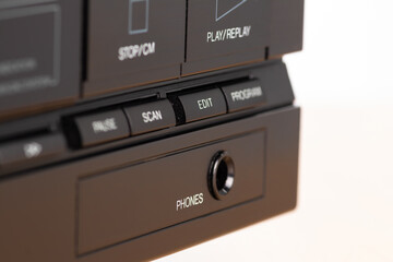 Fototapeta premium Close-Up of Vintage Audio Equipment Control Panel With Buttons and Headphone Jack