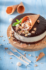 Sweet cookie cake with ice cream cone decoration.