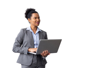 Stylish African American professional analyzing data on a laptop in her hands