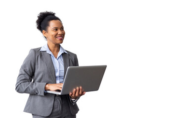 Skilled African American CEO checking presentations on a laptop while holding it