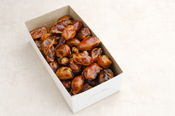 Kurma Sukari or Sukkari Dates Fruit,  Served in box, Top view
