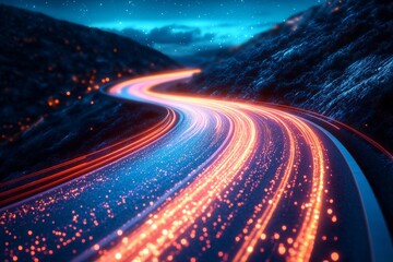 Bright lights and winding roads create a captivating view of a night landscape in a mountainous area