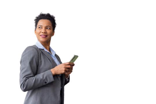 Experienced African American executive texting on her phone