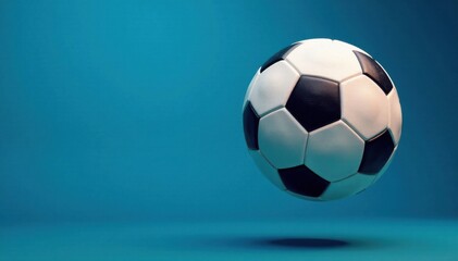 Fototapeta premium Football ball flying through air with blue background , action, sport, blue
