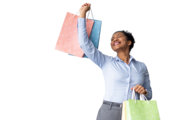 Elegant African American woman carrying designer shopping bags