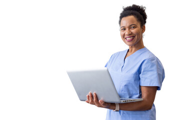 Skilled nurse balancing a laptop while working