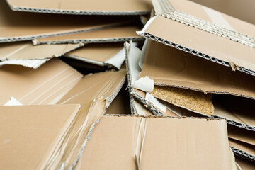 Pile of flattened cardboard boxes ready for recycling or disposal
