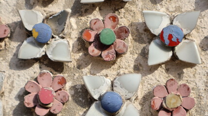 Art created from tiles and cement on the temple wall