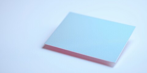 Blank Pastel Blue Card with Subtle Pink Reflection on a Clean Background, Minimalist Branding Mockup