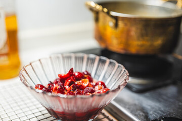 sweet dessert with cherry in a glass bowl