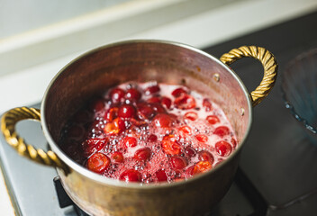 pouring whiskey into jam,homemade healthy jam