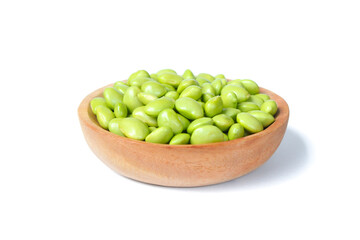 Soy beans edamame in a wooden plate isolated on white background. Fresh soy beans edamame