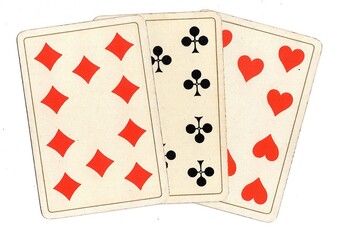 Antique playing cards showing three of the same value on a white background.