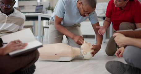 First aid training, person and instructor with mannequin for medical simulation, airway position and injury rescue. CPR demonstration, learning or dummy for health and safety support at workplace