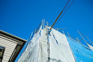 Fototapeta premium Construction site with gray sheeting.