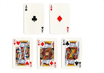 A poker hand of playing cards on a white background.