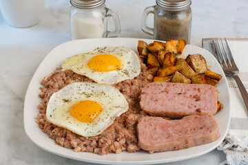 fried eggs with spam and hash browns