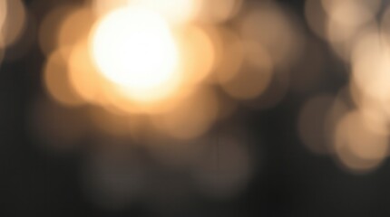 Dreamy golden lights dance in a soft bokeh, creating a warm and magical abstract background.