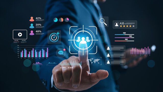 Digital marketing strategy and audience targeting concept. Businessman interacts with data analytics dashboard, customer engagement insights, online advertising trends, and conversion tracking