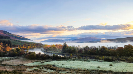 The silence of dawn – as the mist slowly rises, the scenic beauty of the Scottish Highlands is revealed