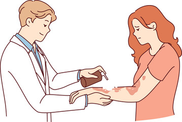 Dermatologist treats eczema on hands of woman suffering from skin disease and pigmentation spots. Man doctor in white coat uses spray for eczema, applied medicinal ointment to body of upset girl