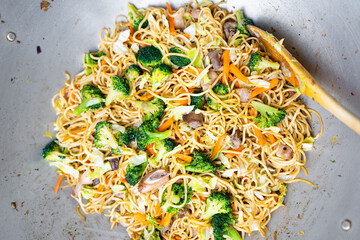 Colorful Stir-Fry Noodles with Fresh Vegetables in Wok