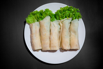 Homemade Spring Rolls with Sesame Seeds ready to serve